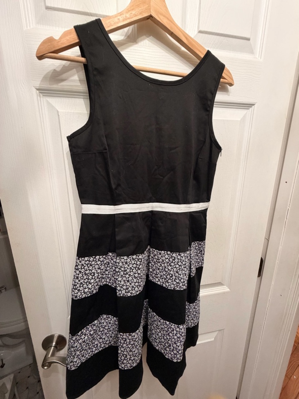 Sleeveless Black Midi Dress with White Waistband and Floral Stripe Skirt